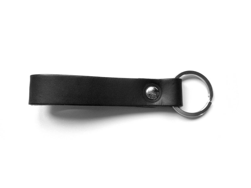 Porte-clés noir en cuir style lanière